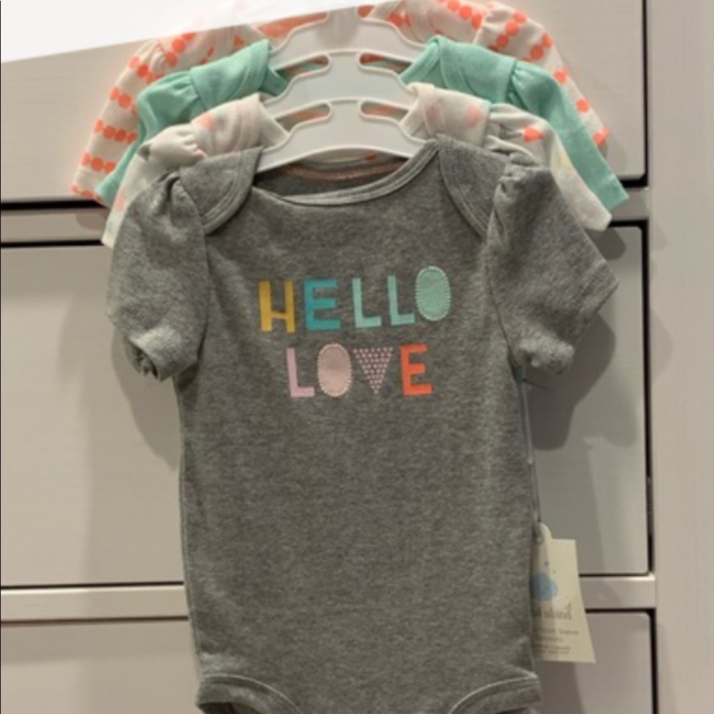 NWT 4 pack Short Sleeve Bodysuits